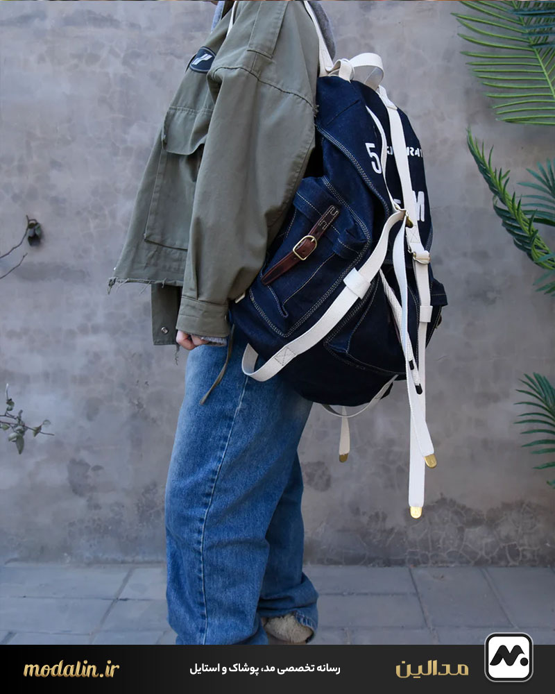 همراهی کوله‌پشتی و اکسسوری‌ها با شلوار جین زاپ‌دار