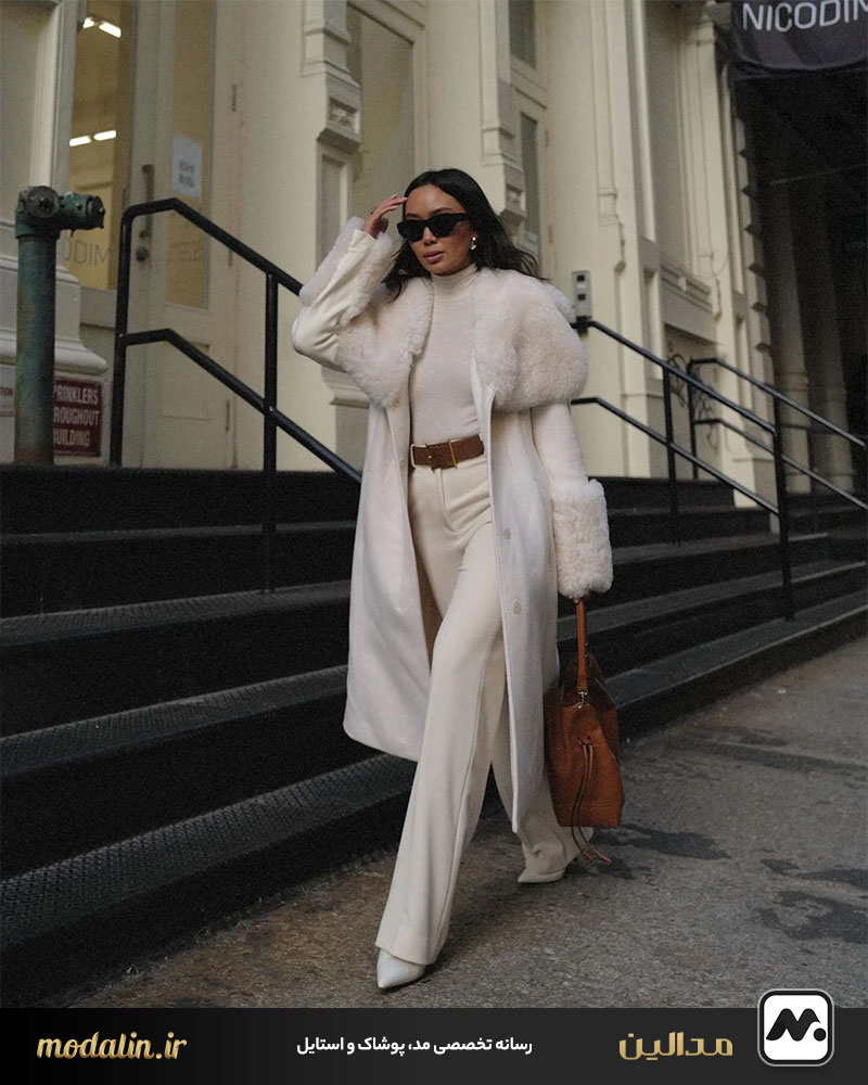 پوشیدن بالاپوش سفید زمستانی